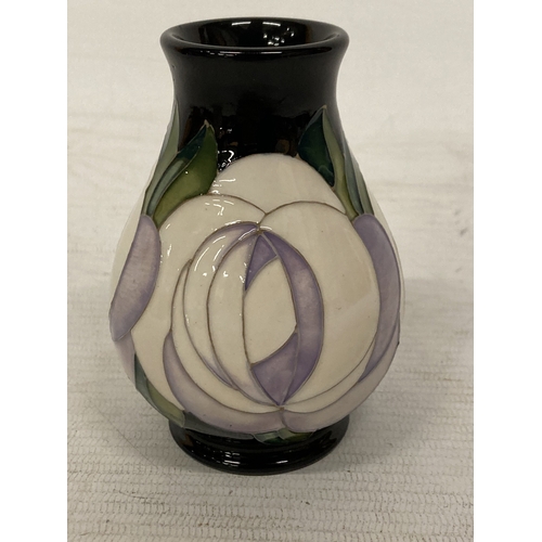 718 - A MOORCROFT WHITE ROSE VASE 11CM TALL