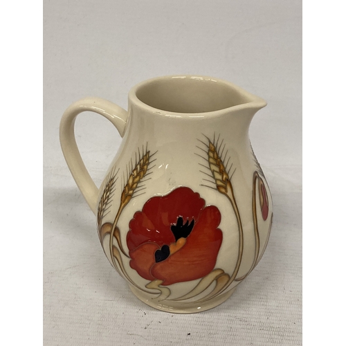 719 - A MOORCROFT HARVEST POPPY JUG 15CM TALL