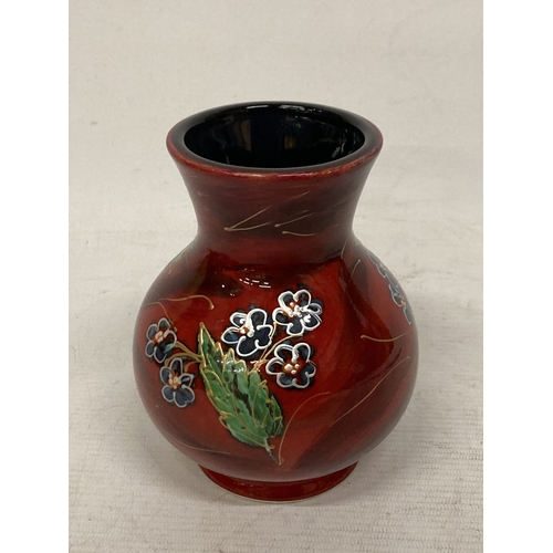 722 - AN ANITA HARRIS HAND PAINTED AND SIGNED IN GOLD BUTTERFLY VASE