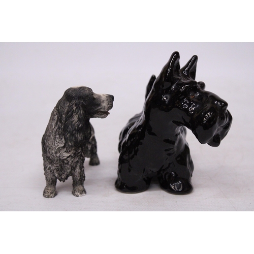 758 - TWO DOG FIGURES TO INCLUDE A SPANIEL AND A BLACK WEST HIGHLAND TERRIER