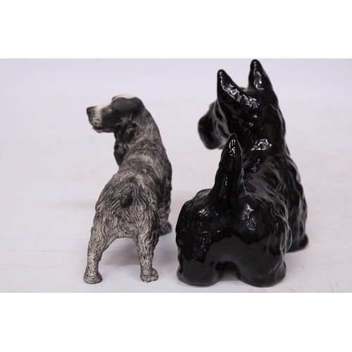 758 - TWO DOG FIGURES TO INCLUDE A SPANIEL AND A BLACK WEST HIGHLAND TERRIER