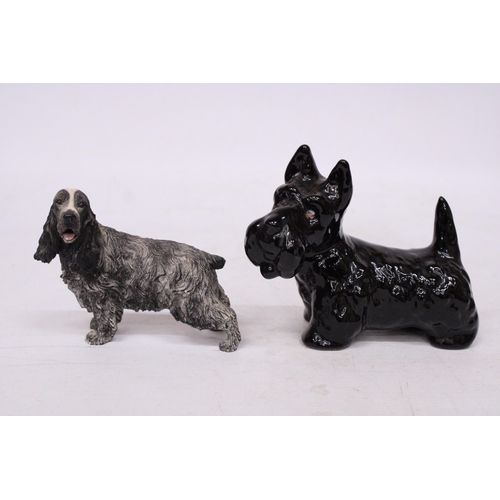 758 - TWO DOG FIGURES TO INCLUDE A SPANIEL AND A BLACK WEST HIGHLAND TERRIER