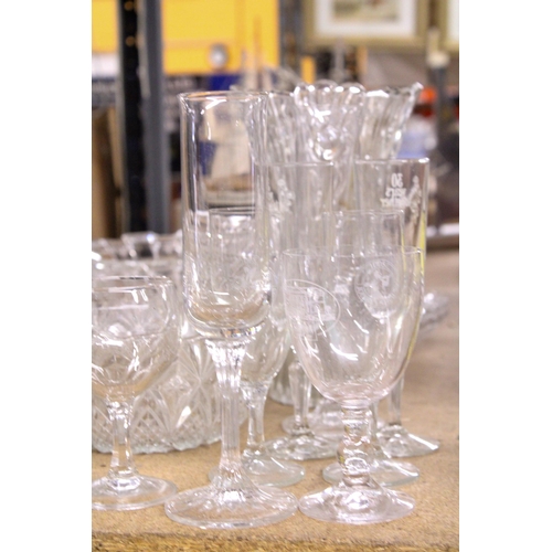 838 - A QUANTITY OF GLASSWARE TO INCLUDE VASES, LARGE BOWLS, GLASSES, ETC