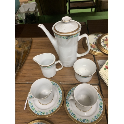 954 - A POLISH COFFEE SET TO INCLUDE A COFFEE POT, CREAM JUG, SUGAR BOWL, CUPS AND SAUCERS