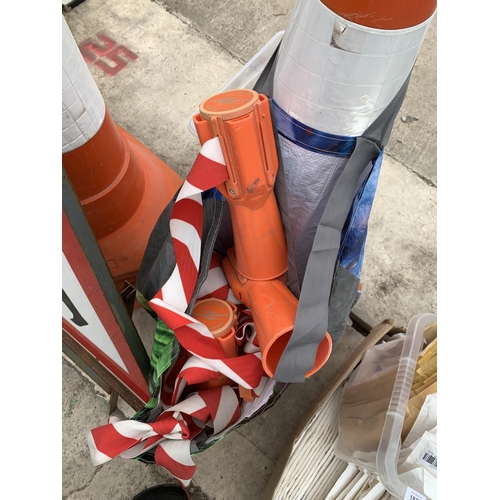 1828 - TEN OVERSIZED ROAD TRAFFIC CONES, TENSION BARRIERS AND A ROAD WORKS SIGN