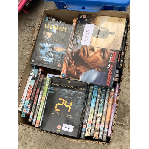 1836 - A LARGE ASSORTMENT OF DVDS AND TOYS