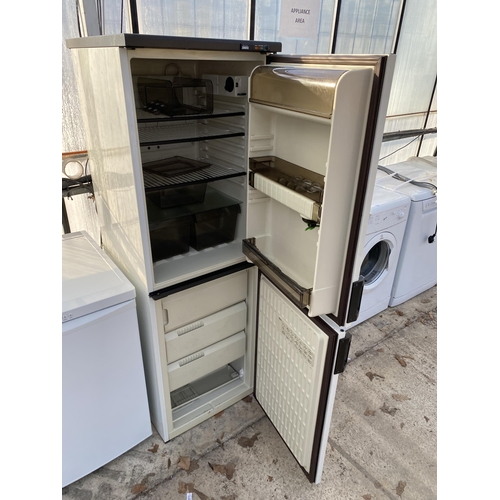 2312 - A WHITE AND BROWN ZANUSSI UPRIGHT FRIDGE FREEZER