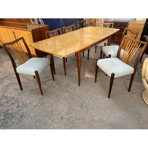 2501A - A RETRO MAPLE EXTENDING DINING TABLE, 56