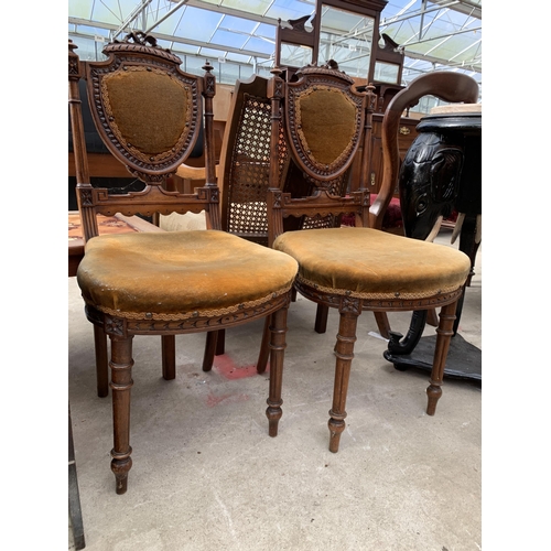 2639 - A PAIR OF VICTORIAN MAHOGANY BEDROOM CHAIRS WITH SHIELD BACKS AND FOLIATE DECORATION