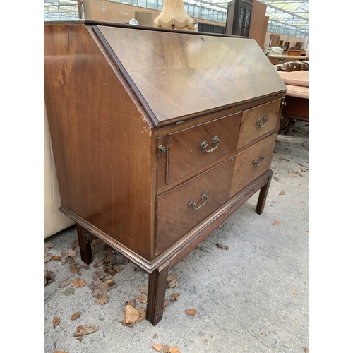 2743 - AN EDWARDIAN MAHOGANY BUREAU WITH FITTED INTERIOR ON OPEN BASE WITH TWO SHORT AND ONE LONG DRAWER, 3... 