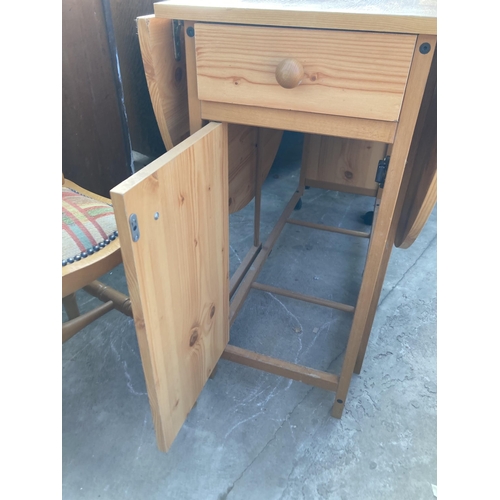 2781 - A PINE EFFECT DROP LEAF KITCHEN TABLE