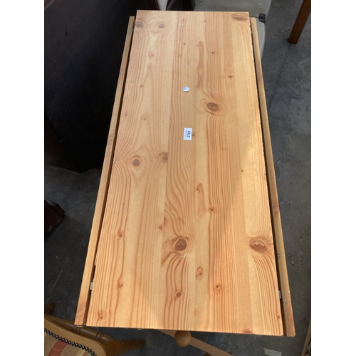 2781 - A PINE EFFECT DROP LEAF KITCHEN TABLE