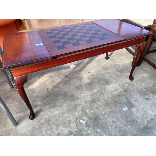 2803 - A COFFEE/GAMES TABLE ON CABRIOLE LEGS