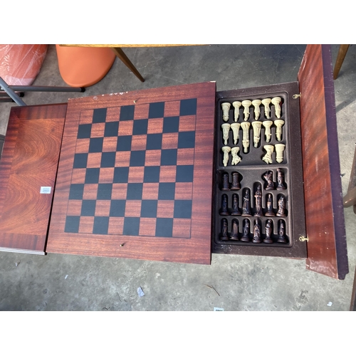 2803 - A COFFEE/GAMES TABLE ON CABRIOLE LEGS