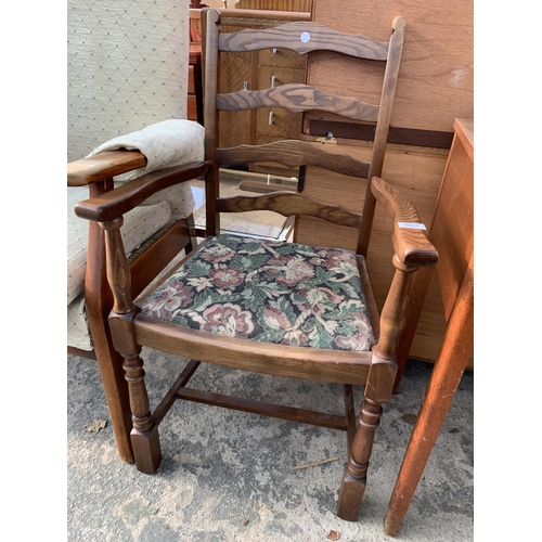 2821 - A TEAK ARMCHAIR AND AN OAK LADDERBACK CARVER DINING CHAIR