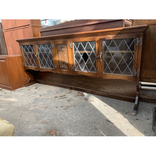 2832 - AN OAK GLAZED AND LEADED DRESSER BACK, 73