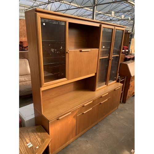 2864 - A RETRO TEAK LOUNGE COCKTAIL UNIT WITH GLAZED DISPLAY CUPBOARD, 70