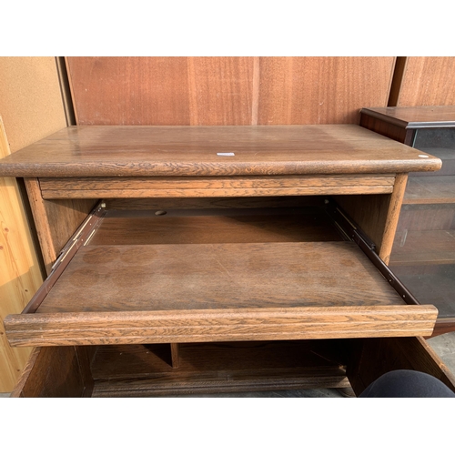 2873 - AN OAK STAND WITH ADJUSTABLE SWIVEL TOP