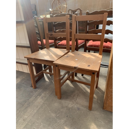 2882 - A PAIR OF PINE KITCHEN CHAIRS