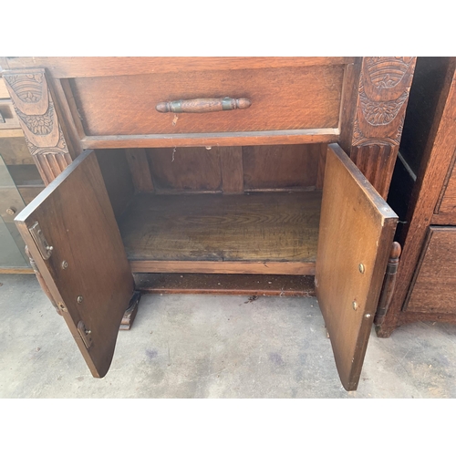 2891 - A MID 20TH CENTURY OAK BUREAU, 30