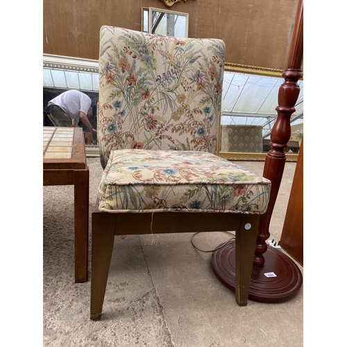 3063 - A BEDROOM CHAIR WITH FLORAL UPHOLSTERY