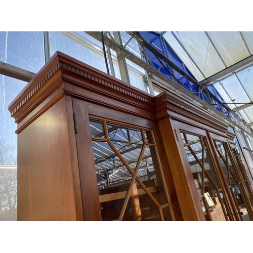 3071 - A YEW WOOD BREAKFRONT FOUR DOOR ASTRAGAL GLAZED BOOKCASE WITH DENTIL CORNICE, FOUR DRAWERS AND FOUR ... 