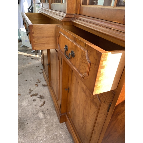 3071 - A YEW WOOD BREAKFRONT FOUR DOOR ASTRAGAL GLAZED BOOKCASE WITH DENTIL CORNICE, FOUR DRAWERS AND FOUR ... 