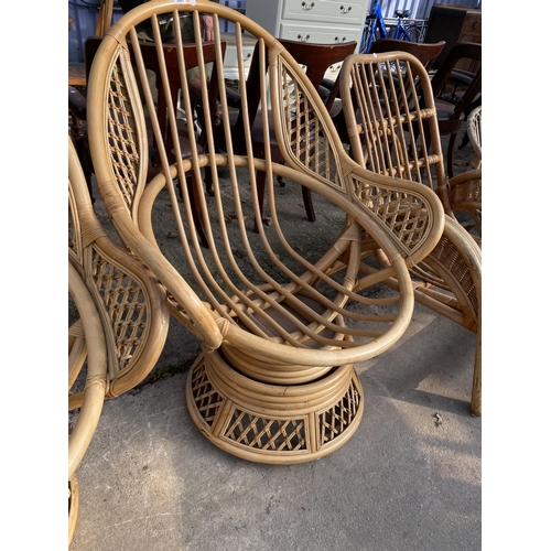 3091 - THREE BAMBOO AND WICKER SWIVEL CHAIRS