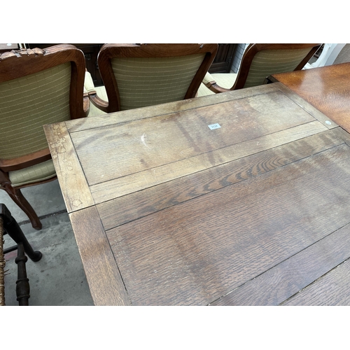 3134 - A MID 20TH CENTURY OAK DROP LEAF TABLE