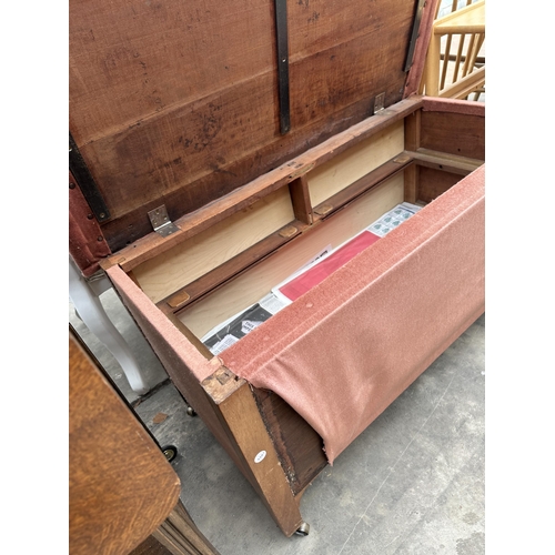 3135 - A MID 20TH CENTURY OAK TWO-TIER TROLLEY AND PADDED BLANKET CHEST