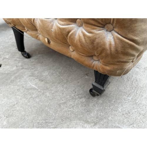 3165 - A VICTORIAN NURSING CHAIR ON EBONISED LEGS, BEARING STAMP TO UPHOLSTERY, MAPLE AND CO