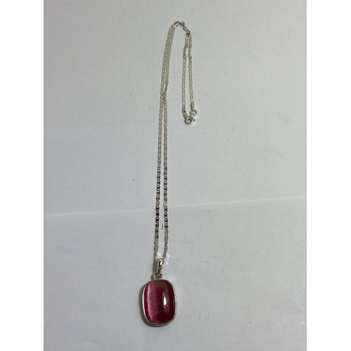 651 - A BOXED MARKED SILVER NECKLACE WITH A PINK STONE PENDANT