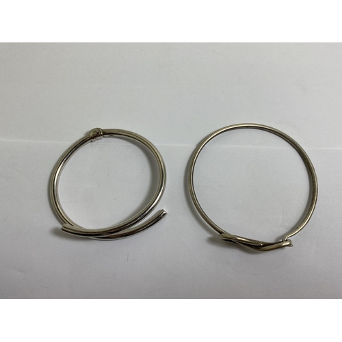 655 - TWO MARKED SILVER BANGLES