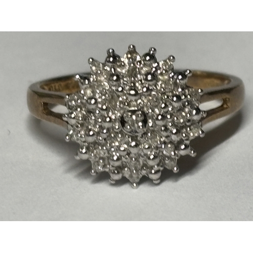 520 - A MARKED 9 CARAT GOLD DIAMOND CLUSTER RING SIZE 0