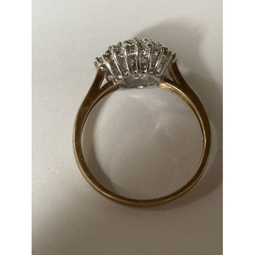 520 - A MARKED 9 CARAT GOLD DIAMOND CLUSTER RING SIZE 0