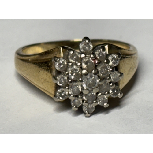 524 - A MARKED 9 CARAT GOLD RING WITH NINETEEN DIAMONDS IN A CLUSTER SIZE K