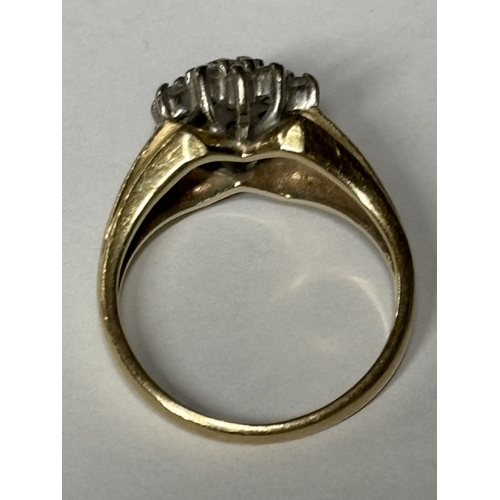 524 - A MARKED 9 CARAT GOLD RING WITH NINETEEN DIAMONDS IN A CLUSTER SIZE K