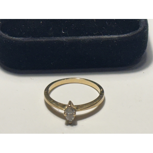 531 - A MARKED 18 CARAT GOLD RING WITH OVAL SHAPED DIAMOND SIZE M/N IN A PRESENTATION BOX