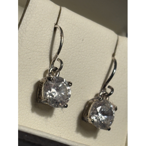 534 - A PAIR OF MARKED SILVER EARRINGS WITH SOLITAIRE CUBIC ZIRCONIAS IN A PRESENTATION BOX