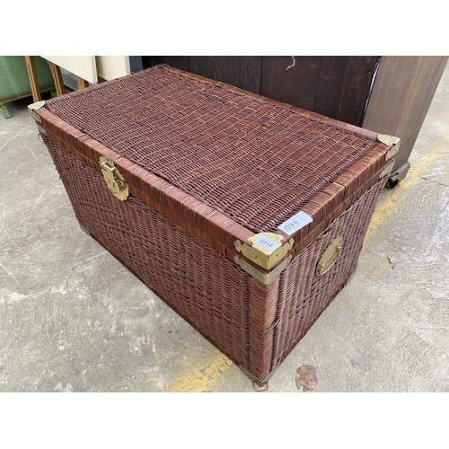 2715 - A WICKER BLANKET CHEST WITH APPLIED BRASS DECORATION, 35