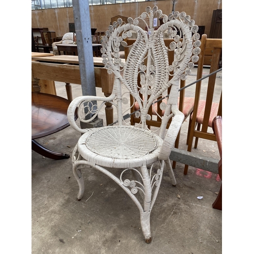 2720 - A WHITE PAINTED WICKER PEACOCK STYLE CHAIR