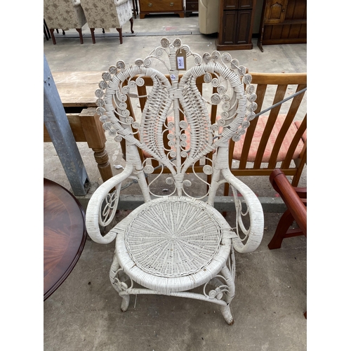 2720 - A WHITE PAINTED WICKER PEACOCK STYLE CHAIR