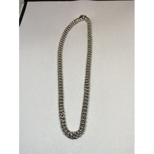 555 - A HEAVY SILVER NECK CHAIN DESIGNED BY FRIEDRICH BINDER MONSHEIM