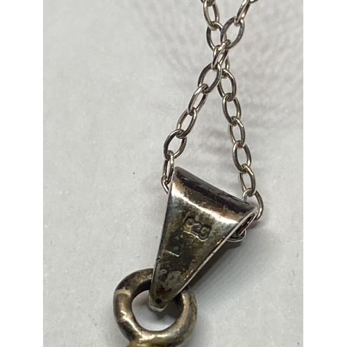 560 - A HEAVY MARKED SILVER KEY PENDANT WITH CHAIN IN A PRESENTATION BOX