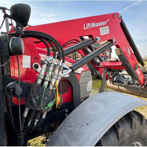 195 - A McCORMICK T3 AGROLUBE 4 WHEEL DRIVE 95hp. TRACTOR AND McCORMICK LIFT MASTER FORE END LOADER ML63 5... 
