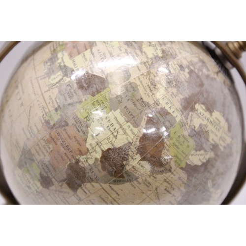 291 - A WORLD GLOBE ON A WOODEN BASE, HEIGHT 25CM