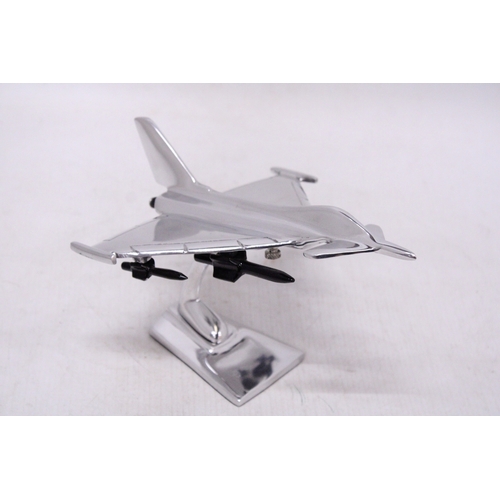 297 - A CHROME MODEL OF A FIGHTER JET, HEIGHT 15CM, LENGTH 21CM