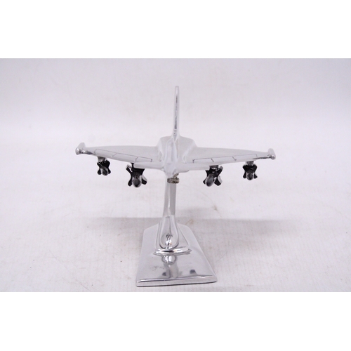 297 - A CHROME MODEL OF A FIGHTER JET, HEIGHT 15CM, LENGTH 21CM