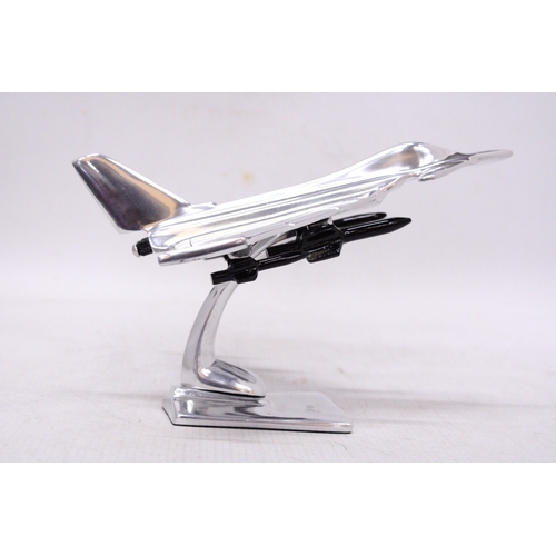 297 - A CHROME MODEL OF A FIGHTER JET, HEIGHT 15CM, LENGTH 21CM