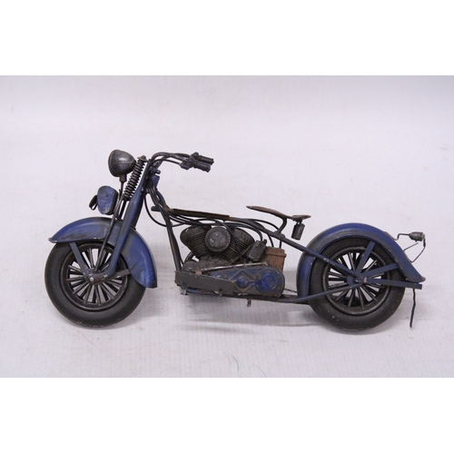 298 - A VINTAGE STYLE BLUE METAL MOTORBIKE